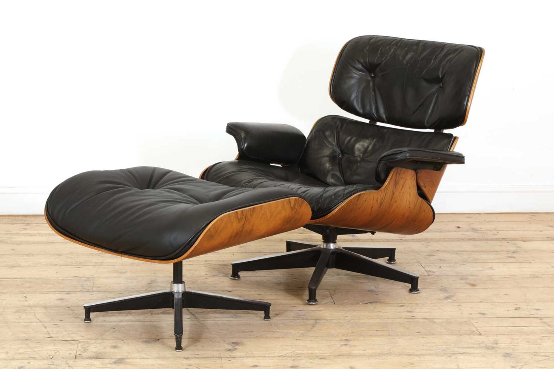 An Eames 'Model 670' and 'Model 671' rosewood lounge chair and ottoman, - Image 2 of 19