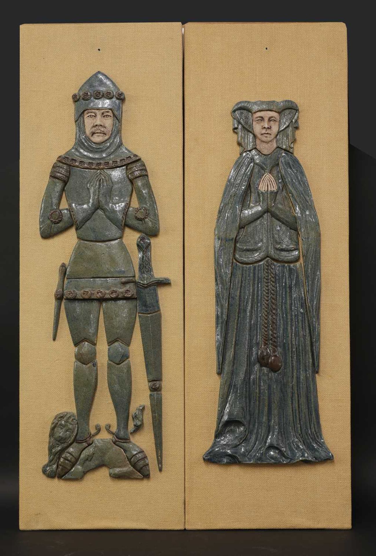 A pair of glazed pottery 'King Arthur' and Maid Marian',