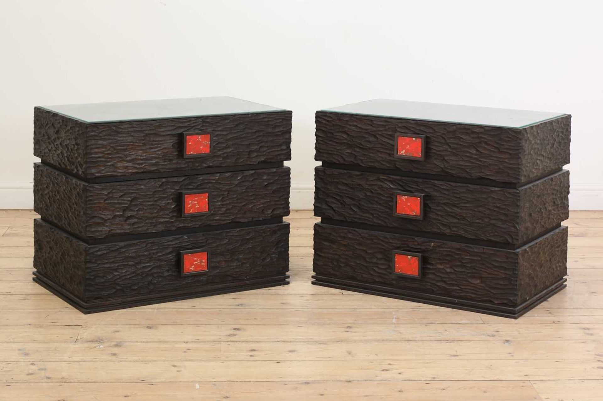 A pair of brutalist bedside chests,