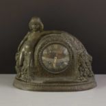 An Art Deco patinated bronze mantel clock,