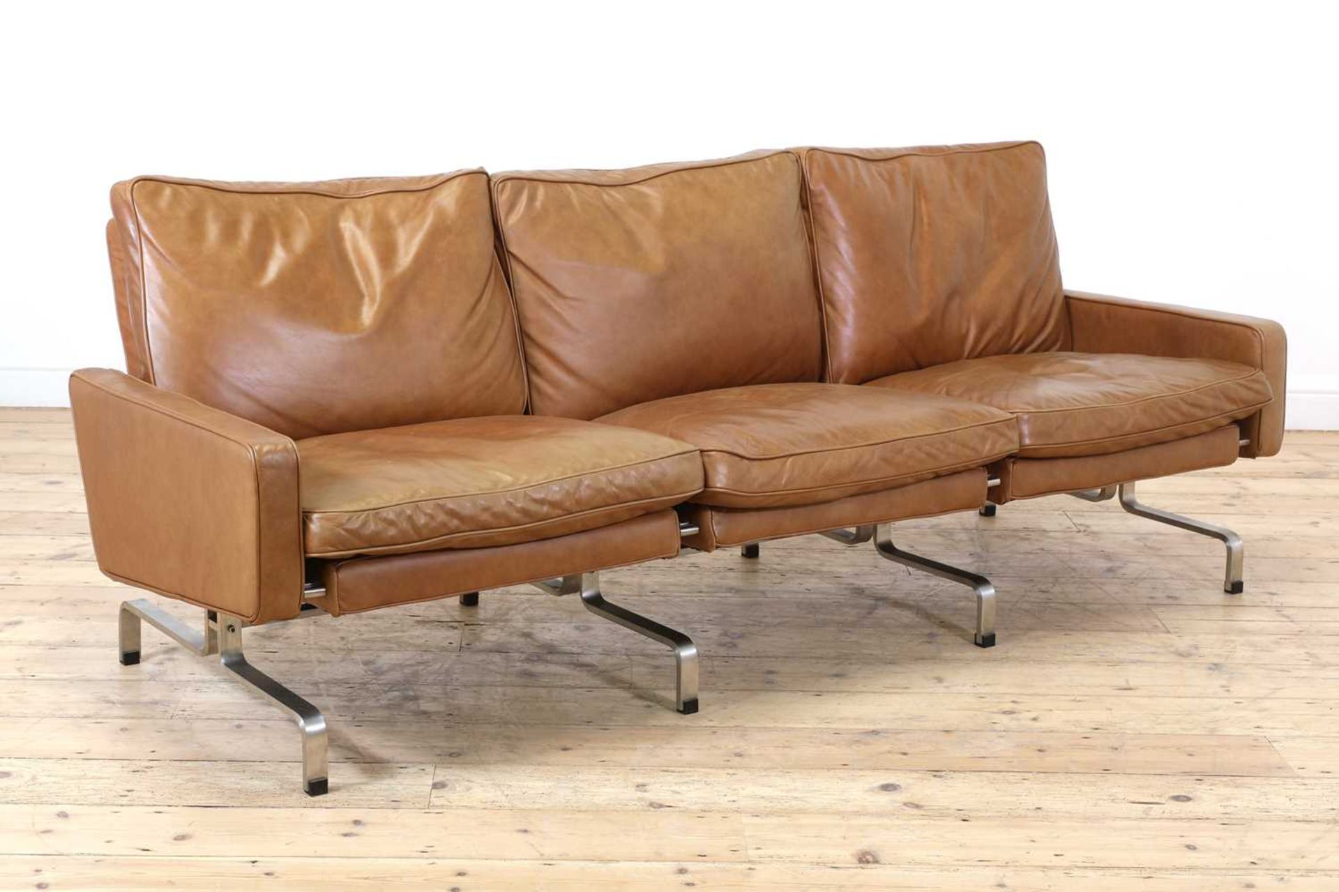 A 'PK31/3' style leather sofa,