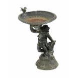 A lead bird bath,