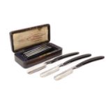 A cased set of Victorian seven-day razors by Wilkinson,