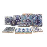 A collection of Islamic pottery tiles,