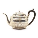 A George III silver teapot,