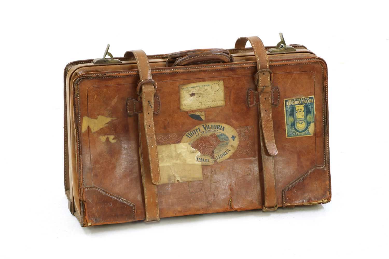 A vintage brown leather travel bag