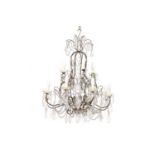 A wrought metal and cut glass chandelier,