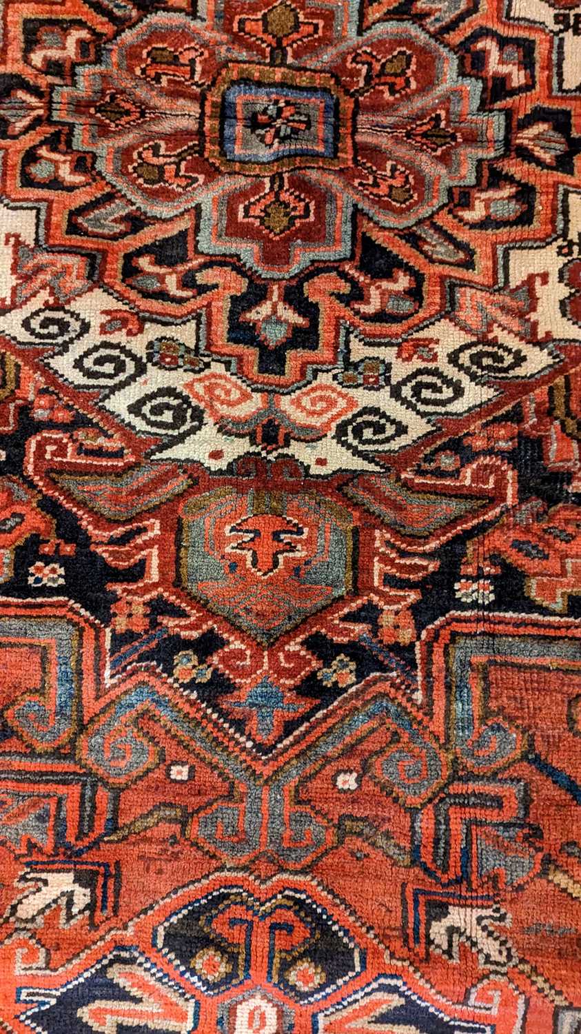 A Heriz carpet - Image 25 of 26