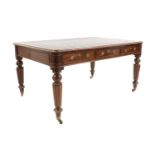 A George IV mahogany writing table