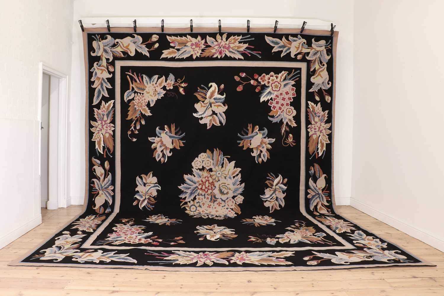 A needlepoint carpet of Aubusson design,