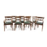 A set of eight late Regency mahogany dining chairs,