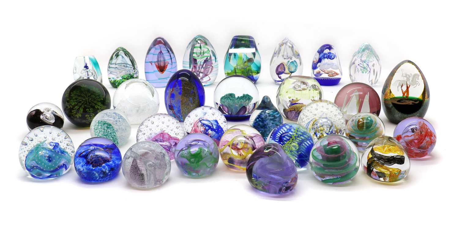 A collection of boxed Caithness glass paperweights