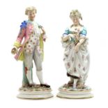 A pair of large continental porcelain figures