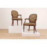 A pair of George III walnut-framed salon armchairs,