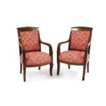 A pair of French Empire mahogany armchairs,