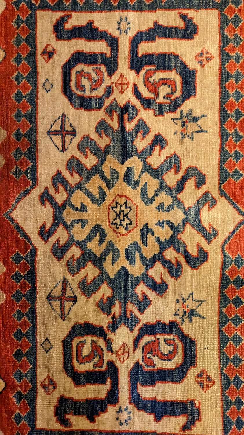 A Kazak rug - Image 18 of 19