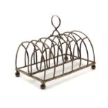 A George III silver seven bar toast rack