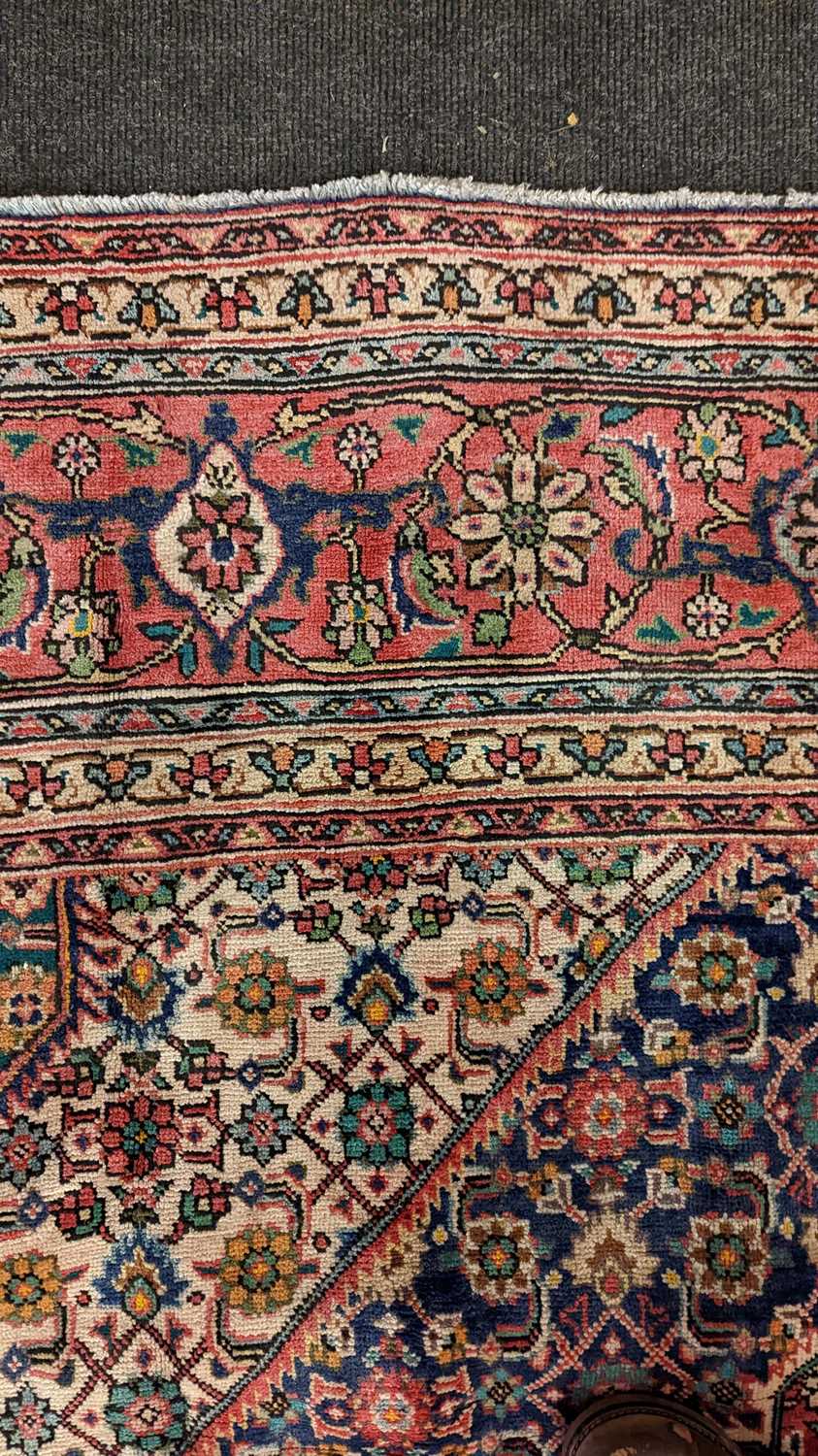 A Tabriz carpet - Image 7 of 21