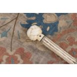 A marine ivory walking stick,