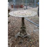 A cast iron garden table,