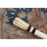 A marine ivory and inlaid walking stick,