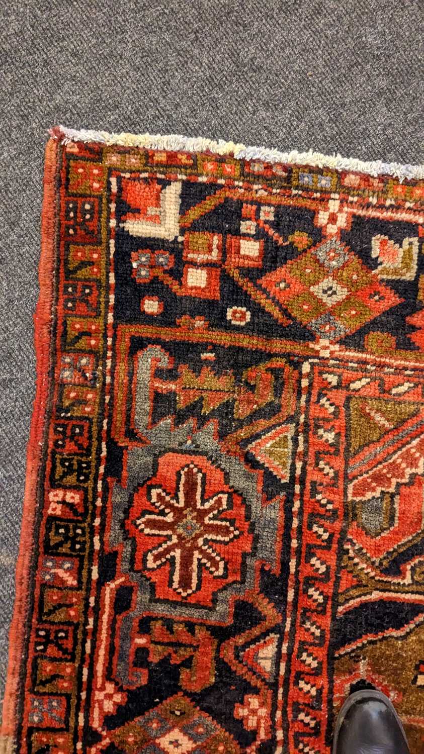 A Heriz carpet - Image 7 of 26