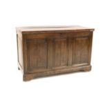 A panelled oak chest