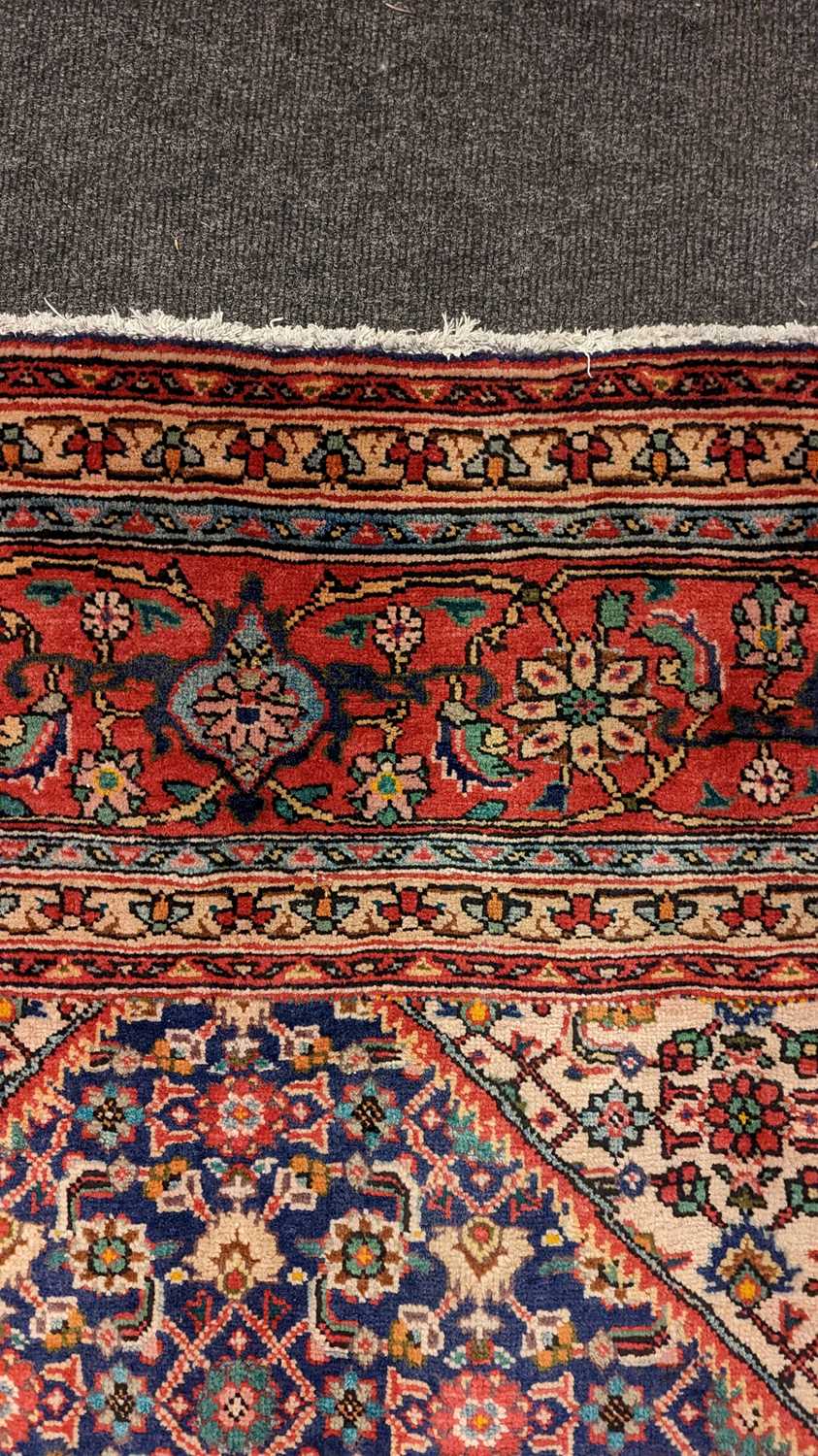 A Tabriz carpet - Image 17 of 21