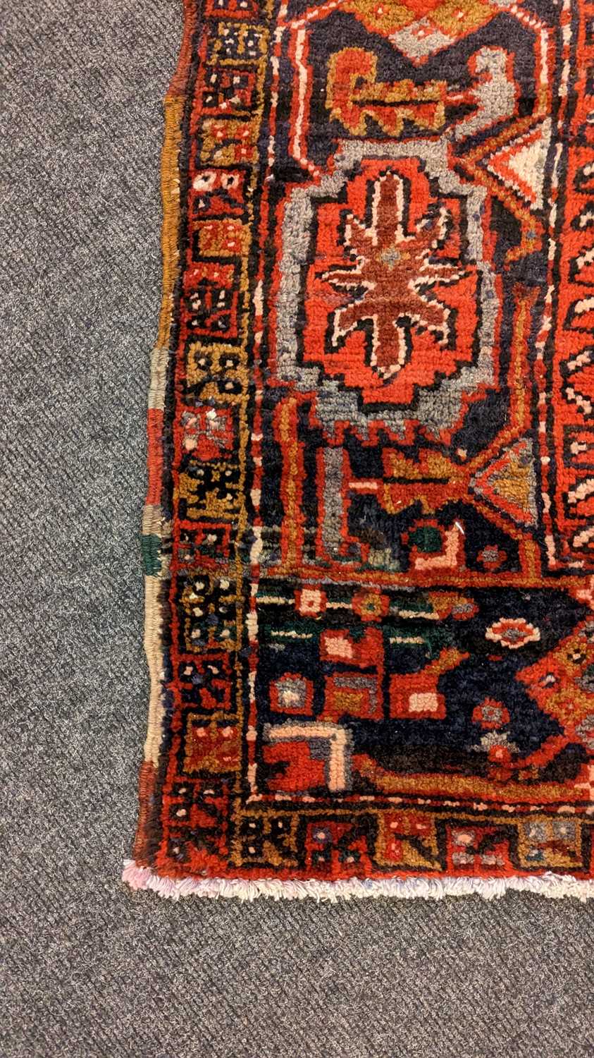 A Heriz carpet - Image 20 of 26