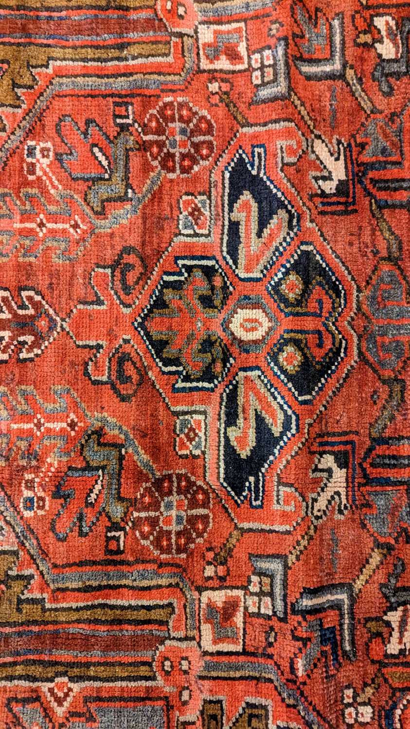 A Heriz carpet - Image 24 of 26