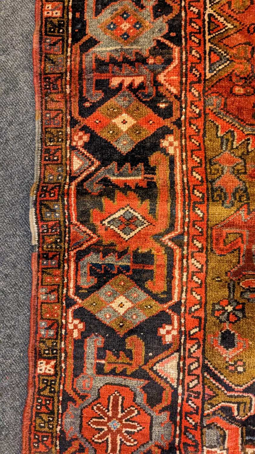 A Heriz carpet - Image 11 of 26