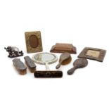 A collection of silver dressing table items