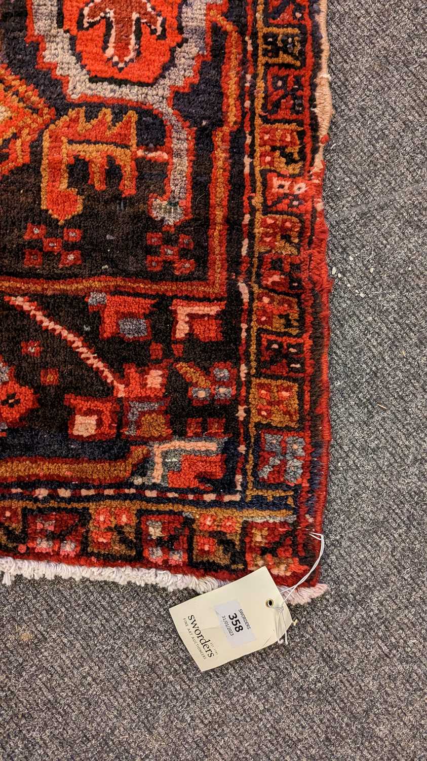 A Heriz carpet - Image 15 of 26