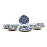 A collection of Chinese blue and white plates and saucers,