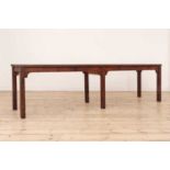 A pine refectory table of slender proportions,