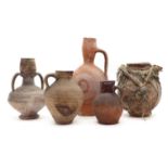 A collection of five terracotta vases,