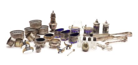 A large collection of silver cruet items