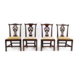 A two similar pairs of mahogany chairs,