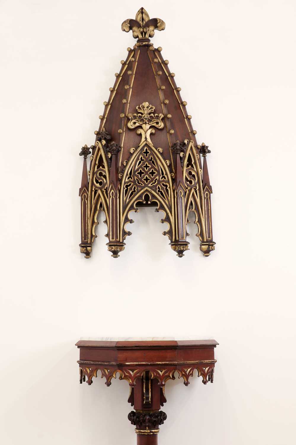 A Gothic Revival parcel-gilt pier table,