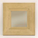 A Neptune style oak wall mirror