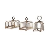 A pair of six division silver toast racks