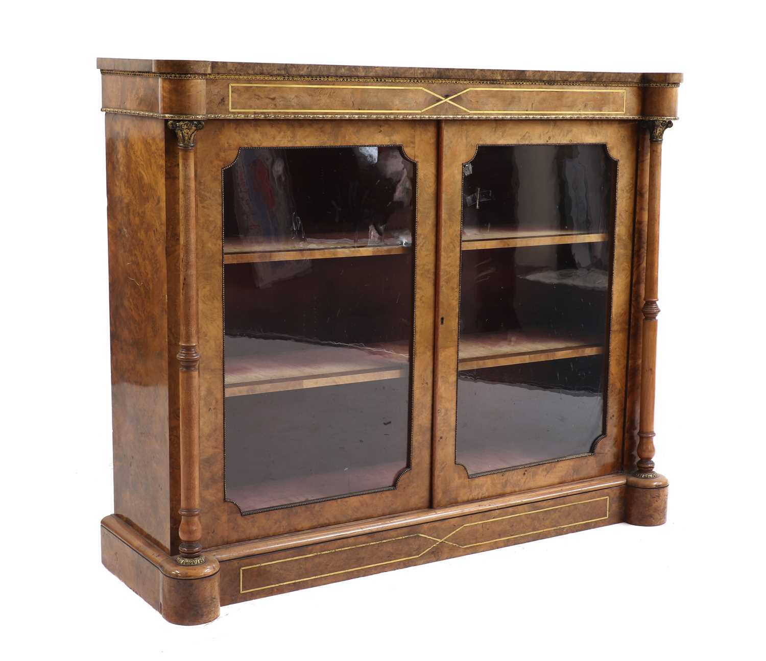 A walnut and gilt metal mounted credenza