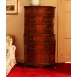 A mahogany bow front chest on chest,