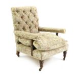 A Victorian open armchair