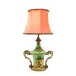 A French ormolu mounted porcelain table lamp