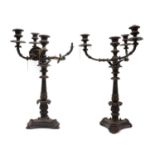 A large pair of three-branch silver plated candelabra