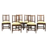A set of six oak country Sheraton dining chairs,