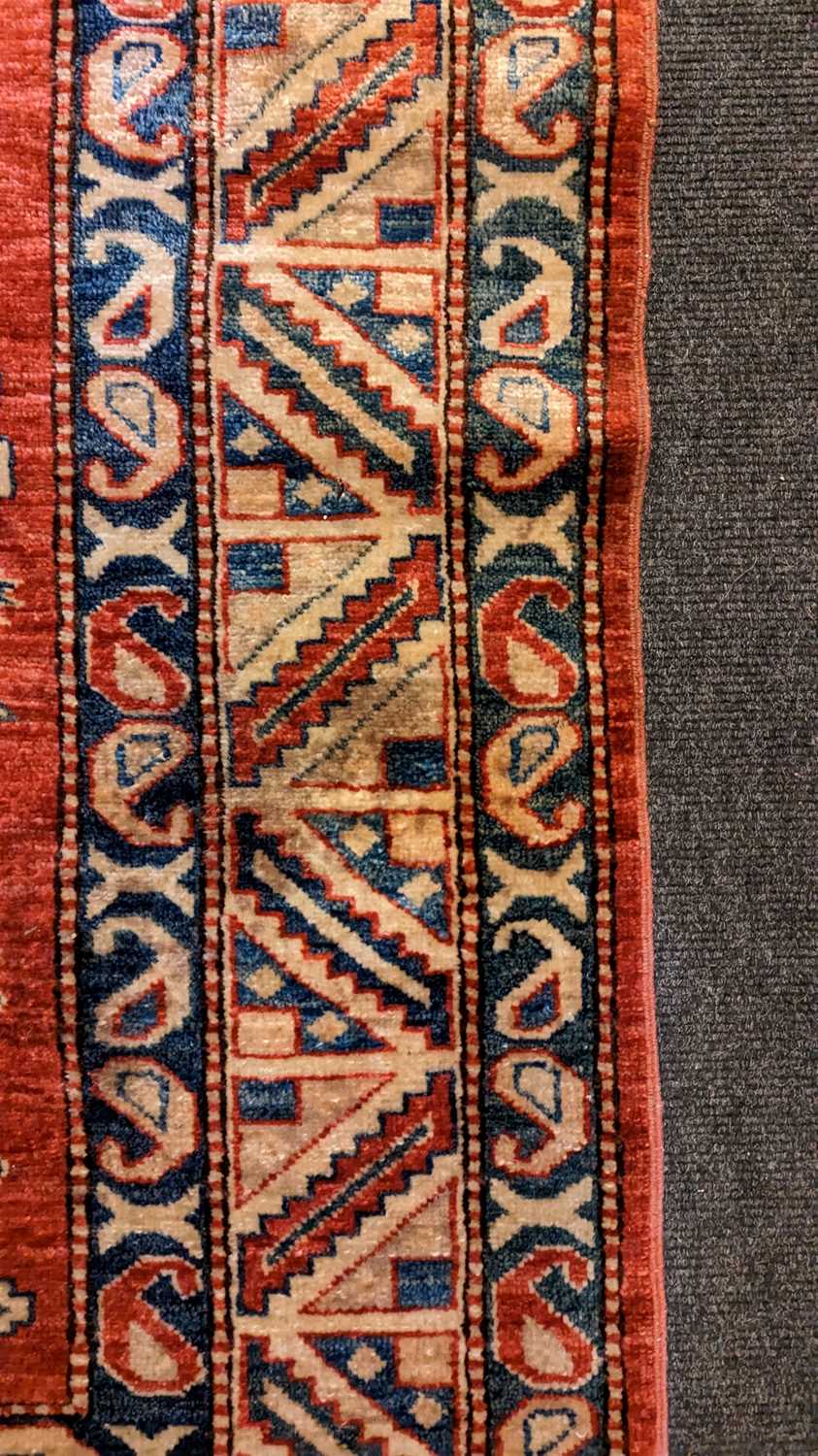 A Kazak rug - Image 16 of 19