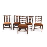 Three Georgian mahogany scroll back dining chairs,
