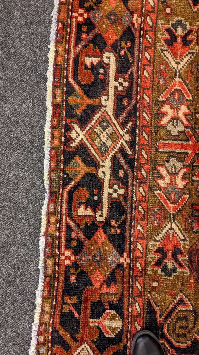 A Heriz carpet - Image 12 of 26